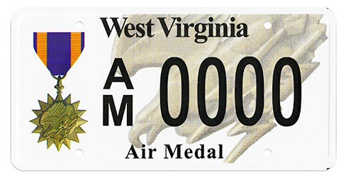 A West Virginia military license plate labeled 'Air Medal' along the bottom, featuring an illustration of the Air Medal on the left, registration number AM 0000 in the center, and a faint eagle graphic in the background
