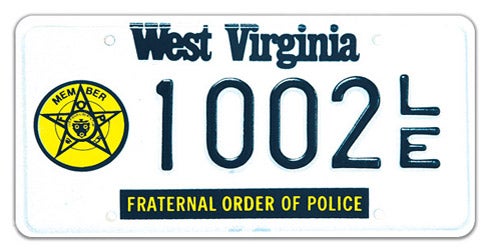 A West Virginia specialty license plate for the Fraternal Order of Police, featuring a yellow star badge emblem on the left, a dark blue bottom banner reading 'FRATERNAL ORDER OF POLICE', and sample registration number 1002 LE